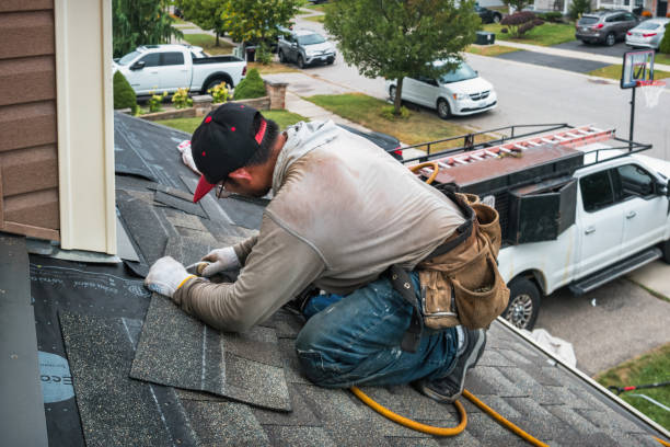 Professional Roofing technician working in Gibson, NC